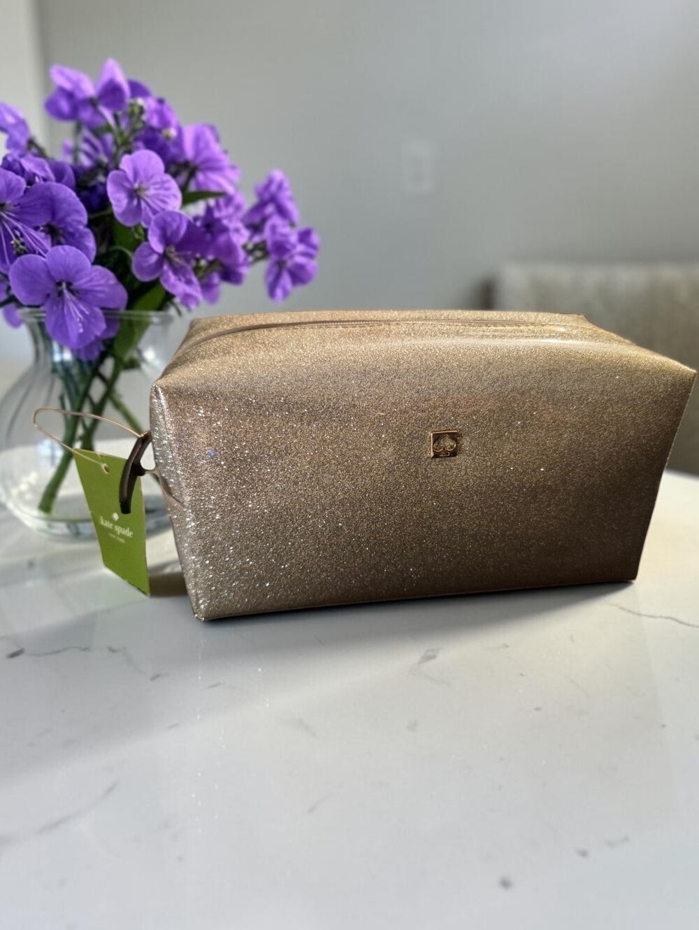 Kate Spade New York Mavis Street "Davie" Cosmetic Case in Silver Glitter.